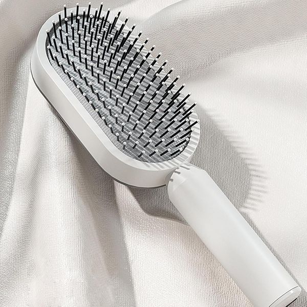 Массажная расческа Central Hollow Cushion Comb 3D для кожи головы ∙ 3D расческа для волос Central Hollow Cushion Comb 57325 фото