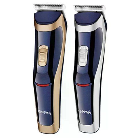 Машинка для стрижки GEMEI GM-6005 &bull; Аккумуляторная машинка для волос GEMEI GM-6005 с 4 насадками 3&ndash;12 мм и работой до 60 минут 58626 фото